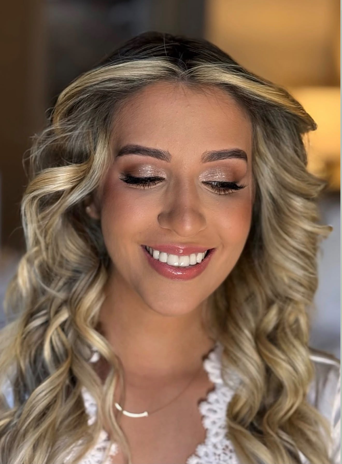 Erika, bride, wearing bridal makeup by Brenda Paixão